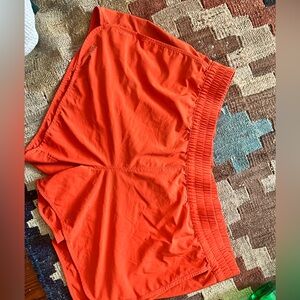 Marmot “Elda” 4” Athletic Shorts in Neon Orange